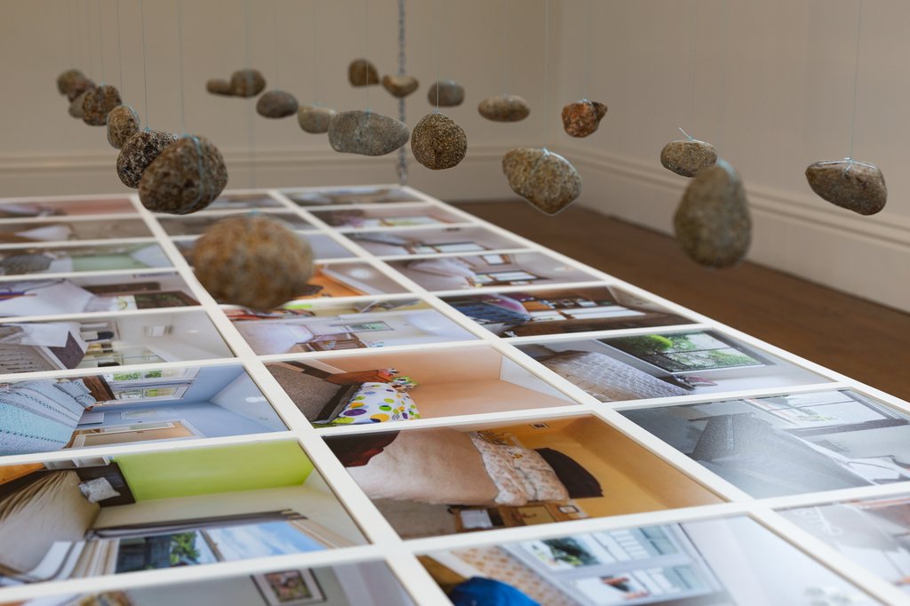 Close up of rocks hanging. Part of Lost Bedrooms installation by Jonny Scholes.